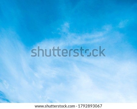 Beautiful blue sky and white clouds of various shapes with sunlight. Nature background Royalty-Free Stock Photo #1792893067