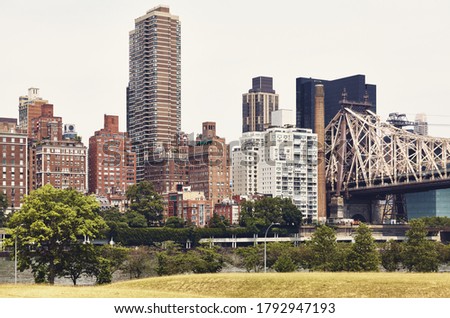 New York City East Side seen from Roosevelt Island, color toned picture, USA.