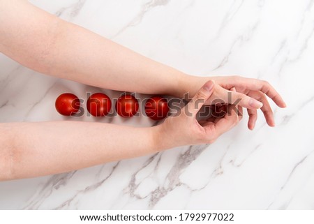 an image of wrapping fruit in one's arms