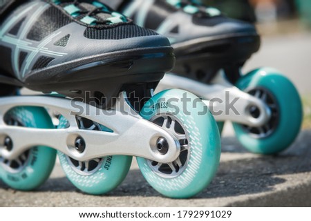 Close up of inline roller skates. Extreme sport. Lifestyle activity. Concept about sport and leisure
