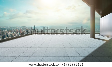 Perspective view of empty concrete tiles floor of rooftop with city skyline, Morning scene Royalty-Free Stock Photo #1792992181