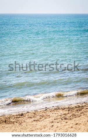 A picture of waves of blue sea