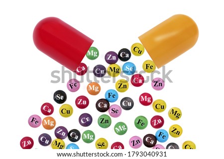 Nutrition concept with a capsule from which trace elements come out Royalty-Free Stock Photo #1793040931