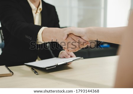 Partnership. business people partner shaking hand after business signing contract desk in meeting room at company office, job interview, investor, business negotiation, partnership, teamwork concept