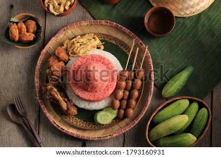 Top View Selected Focus  Red and White  Rice Called Nasi Tumpeng Same as Indonesian National Flag for Independence Day Celebration at 17 August Royalty-Free Stock Photo #1793160931