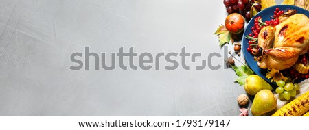 Tasty turkey served on grey table, top view with space for text. Banner design