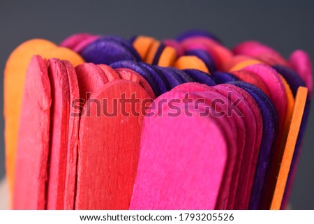 Closeup view of Colourful Ice cream sticks making background