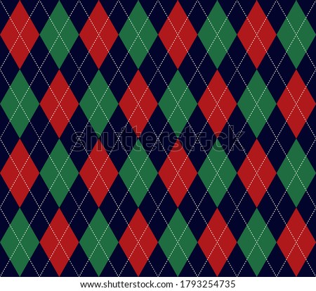 Argyle seamless plaid pattern with red, Green, blue colors. Print for cloth design, textile, fabric, wallpaper, wrapping paper, tile, packaging, background, decor. Christmas  plaid pattern