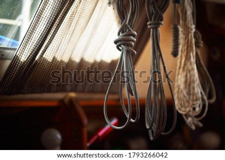 Sailing ropes and knots close-up. Special equipment, rigging, traditional craft, technology themes. Macro photography, graphic resources