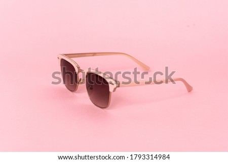 glasses over isolated colorful background