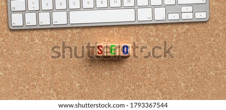 cubes with message SEO on cork background
