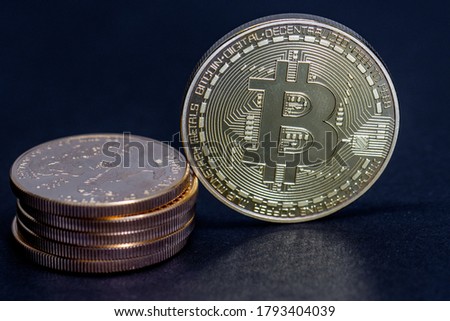 a gold Bitcoin coin is equivalent to a stack of gold dollars worth 10000 dollars