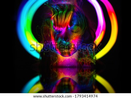 light painting portrait, light drawing at long exposure,  abstract colorful background , lgbt symbolism