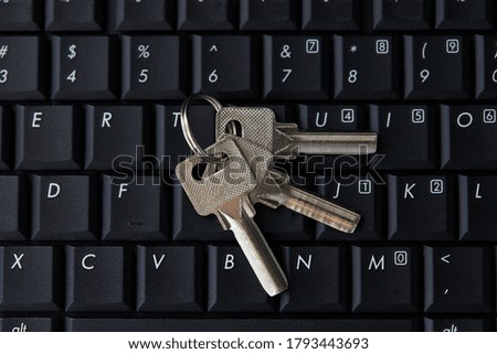 keys on a black laptop keyboard over white background. internet security concept. antivirus software concept. electronic wallet symbol.