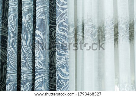 Curtains for windows, tulle for an apartment, a fabric store