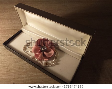 Lovely rose decoration with pearl bracelet