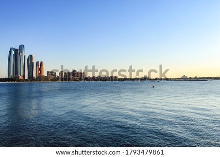 View from the Breakwater towards Etihad Towers and Emirates Palace Hotel and beach, Abu Dhabi, United Arab Emirates, Middle East