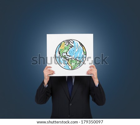 A man holding a picture with the world map (America,Canada, Brazil)