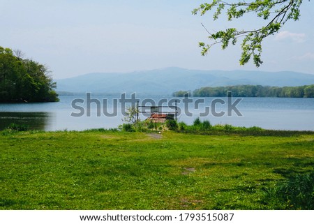A photo of a campsite by a beautiful lake in Hokkaido, Japan.