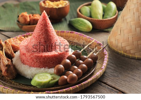 Selected Focus Red and White  Rice Called Nasi Tumpeng Same as Indonesian National Flag for Independence Day Celebration at 17 August Royalty-Free Stock Photo #1793567500