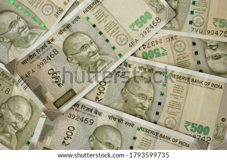 Closeup of brand new colorful Indian currency bank notes of Rs 500  rupees bundle issued and in circulation after demonetisation  Royalty-Free Stock Photo #1793599735