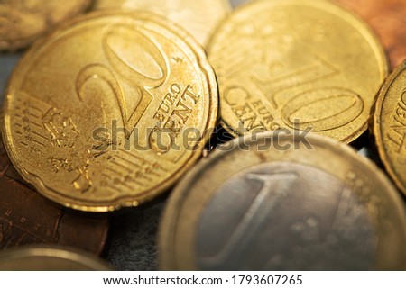 Stack of euro coins on a background. Closeup photo.