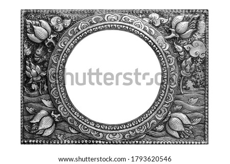 Pattern of flower carved silver picture frame isolated on white background