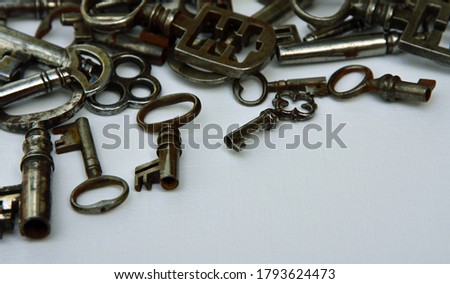 Antique Keys Background with White Copy Space.