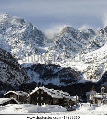 Village under mountains in winter
