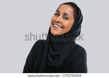 Beautiful middle eastern woman wearing abaya Royalty-Free Stock Photo #1793702404