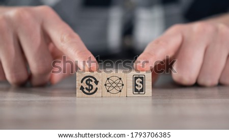 Concept of online banking with icons on wooden cubes