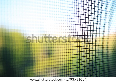 Black mosquito net installed on the window Royalty-Free Stock Photo #1793731054