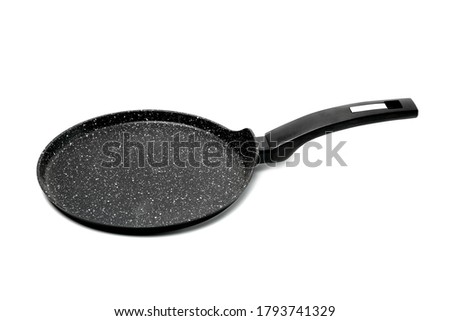 Black frying pan isolated on white background 