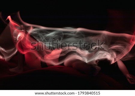light painting portrait, light drawing at long exposure, abstract colorful background