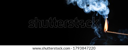 close-up of a beautiful matchstick light isolated on black background, cut out texture or template   Royalty-Free Stock Photo #1793847220