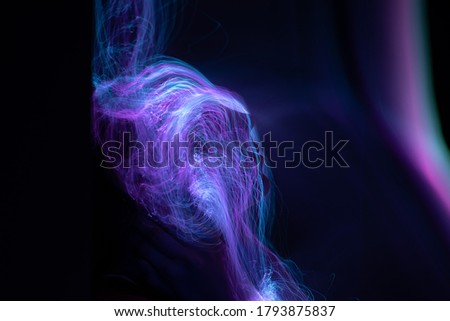 light painting portrait, light drawing at long exposure, abstract colorful background