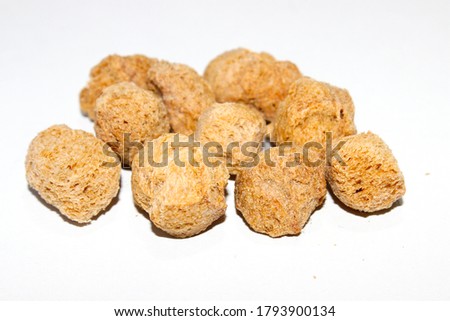 A picture of soya chunks on white background