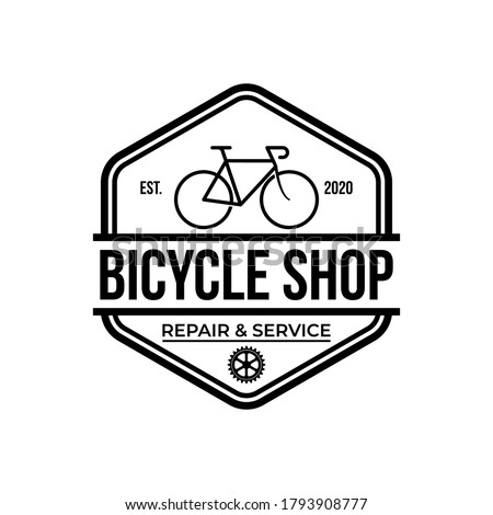 bike shop logo badge and label. Old style bike shop and repair type logo vector