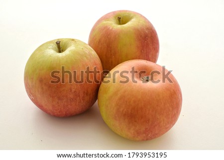 Group of apples isolated on white and blur background. Apple or malus domestica have a good nutrition values and can freshen breathe. Selective focus image. 
