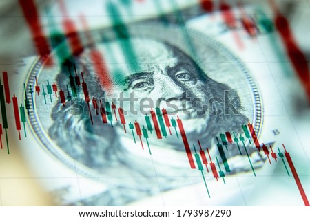 The us dollar against the background of a declining chart. U.S. economy. The economic crisis in America. Decrease in profit. Recession. Royalty-Free Stock Photo #1793987290