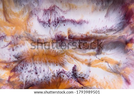 Close-up picture. Colorful background of abstract painting. High quality parts, epoxy resin. Drawing technique the art of resin.