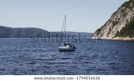 Sailing ship in the middle of Fjord-du-Saguenay near Sainte-Rose-du-Nord (Quebec, Canada)