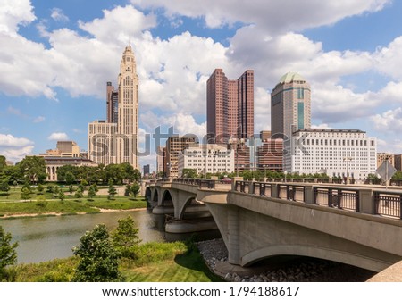 Cityscape of Columbus, Ohio, above the Scioto River from Battelle Riverfront Park