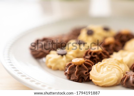 Homemade assorted chocolate bite size butter cookies Royalty-Free Stock Photo #1794191887
