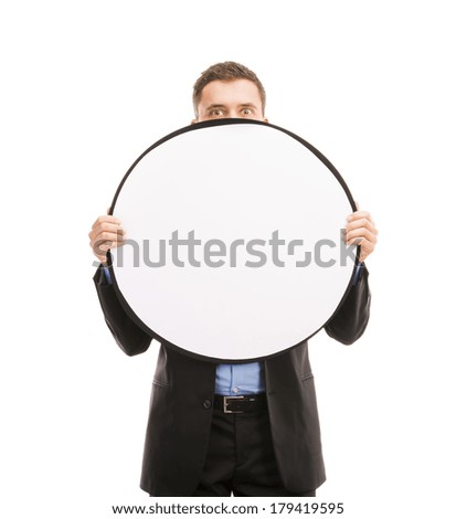 Successful business man is posing with blank copy space. Manager is isolated on white background.