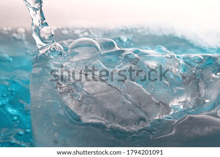 Close up of water and ice block