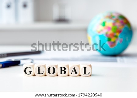 concept picture with globe in a bright office on a desk, concept global 