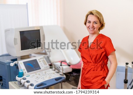 Ultrasound machine, ultrasonography. Medical equipment, healthcare concept. Selective focus. Doctor near equipment.