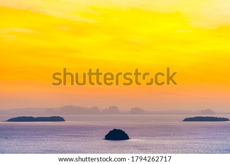 Small island landscape on sunset sea with colorful sunset sky