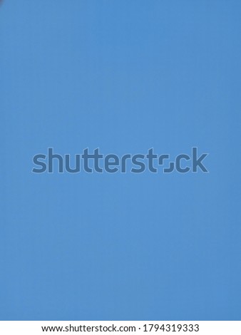 blue background picture of a building wall